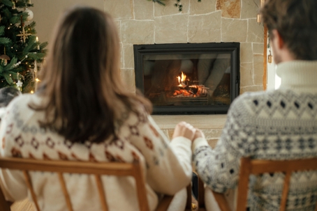 couple enjoying a fireplace